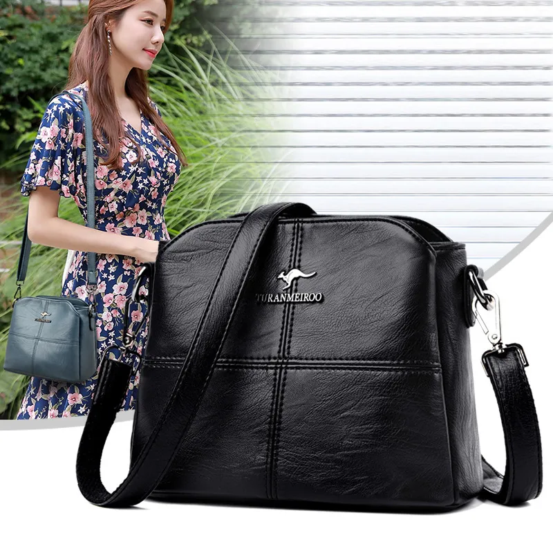 BOLSA TRANSVERSAL COURO