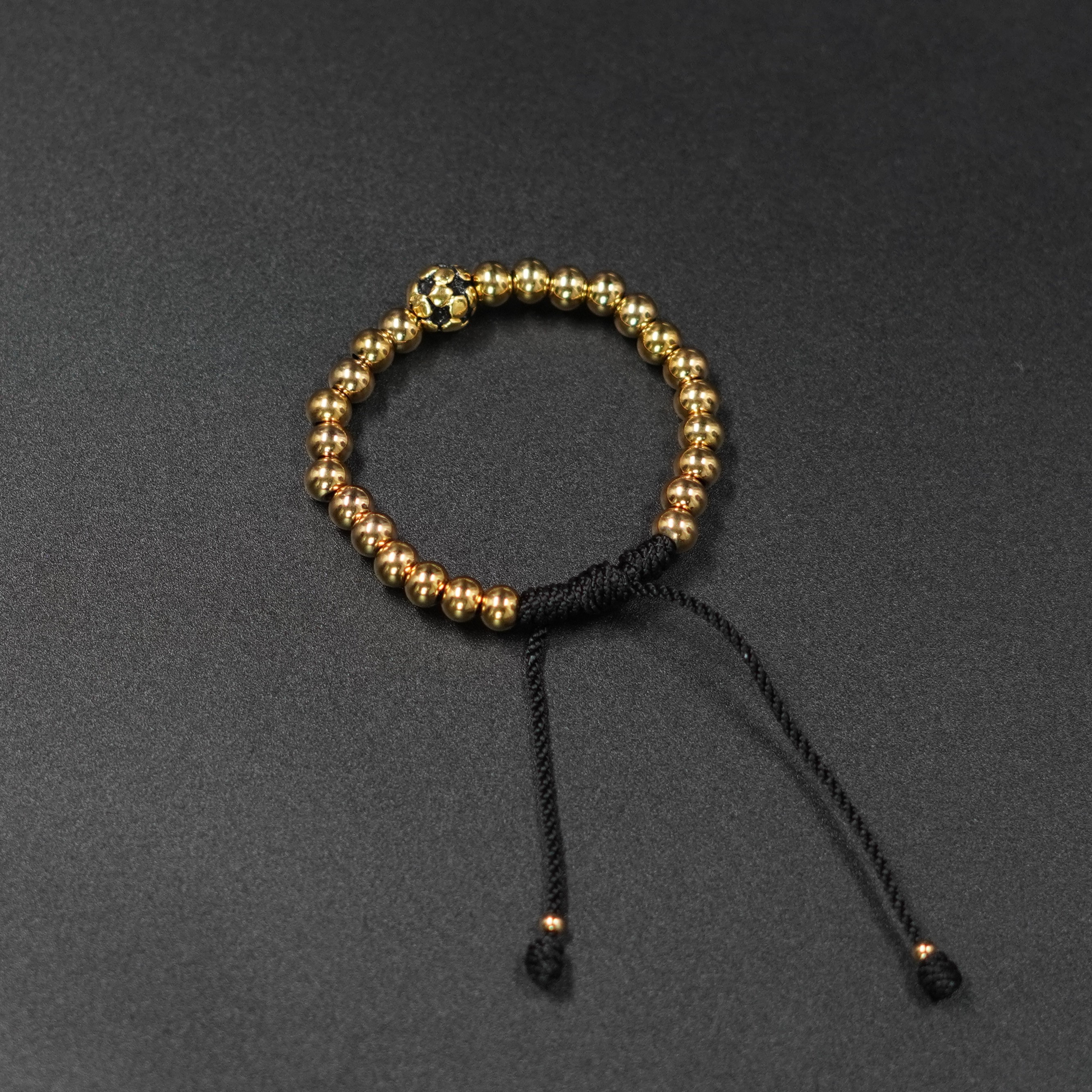 PULSERA CHAMPIONS BALIN SEGUIDO DORADO