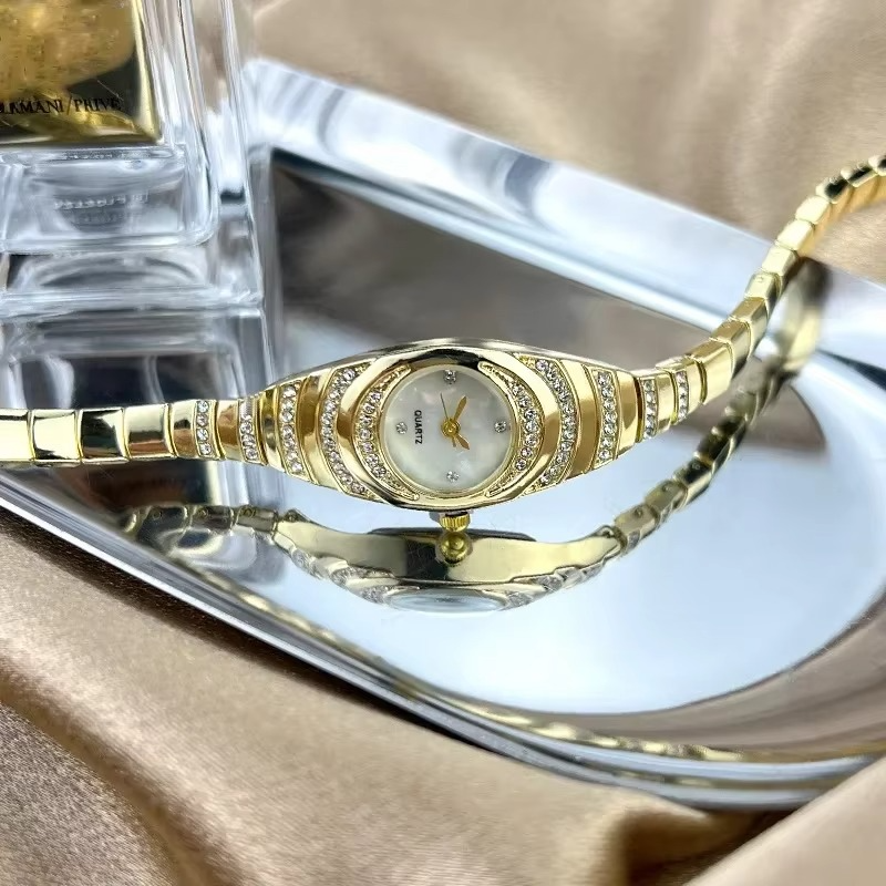 Miniatura 4 de RELOJ DORADO CON BRILLANTES