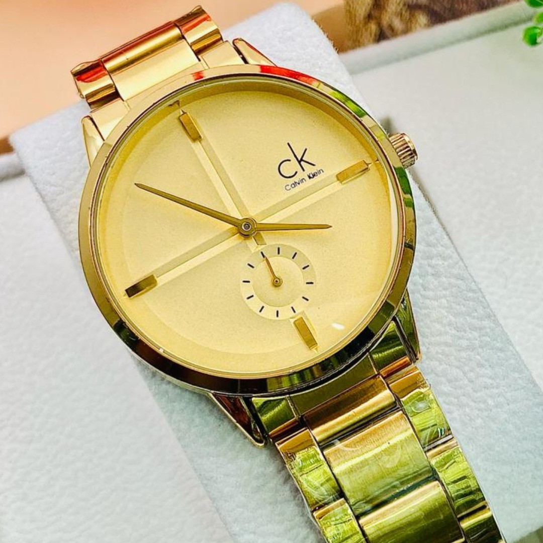 RELOJ CK DAMA DORADO