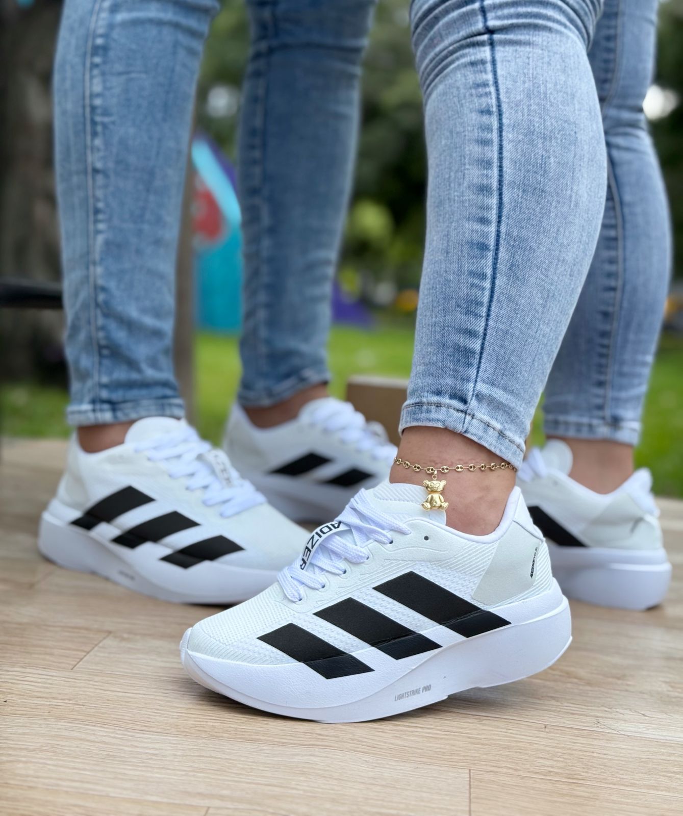 ADIZERO PARA HOMBRE Y MUJER - Vista 1