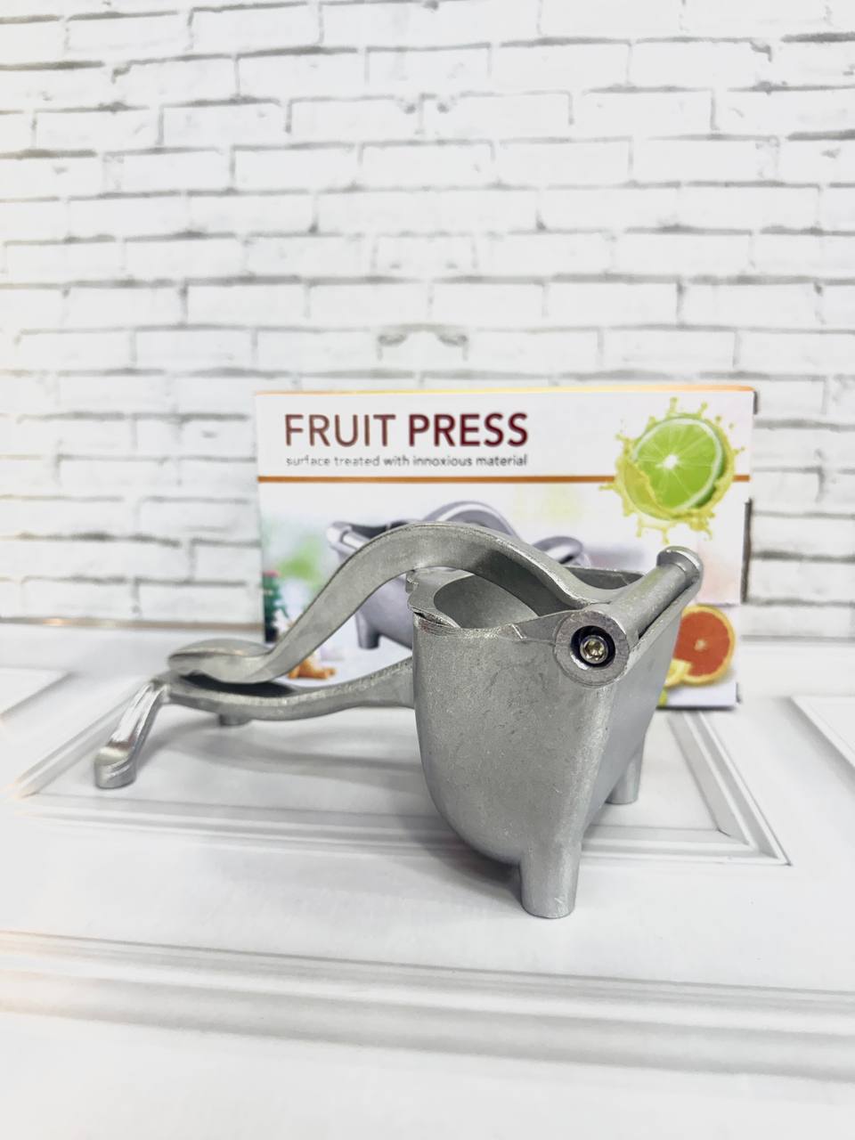 Exprimidor Manual de Frutas Metálico