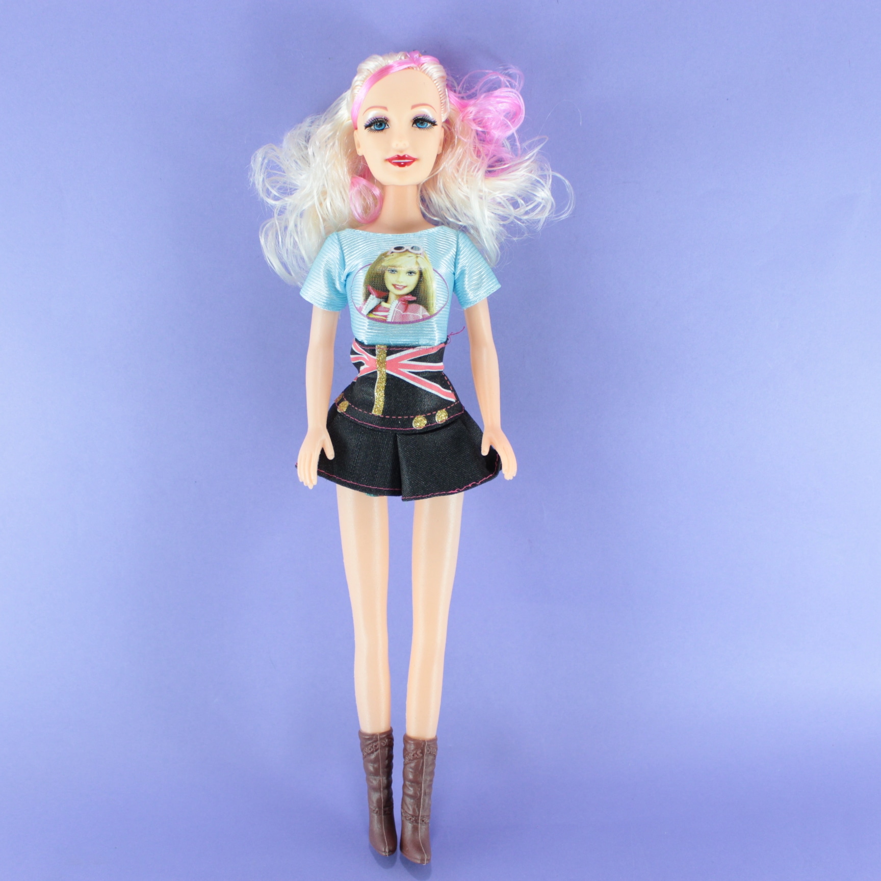 Miniatura 3 de Muñeca musical