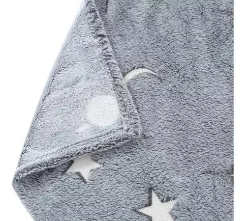 Manta que brilla en la oscuridad , hecha