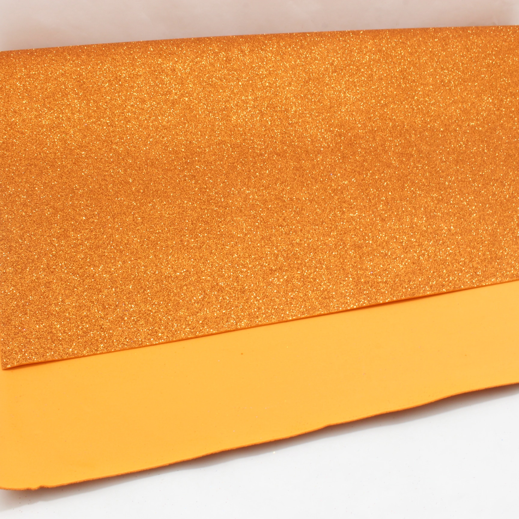 PLIEGO FOMMY ESCARCHADO NARANJA 70X100C