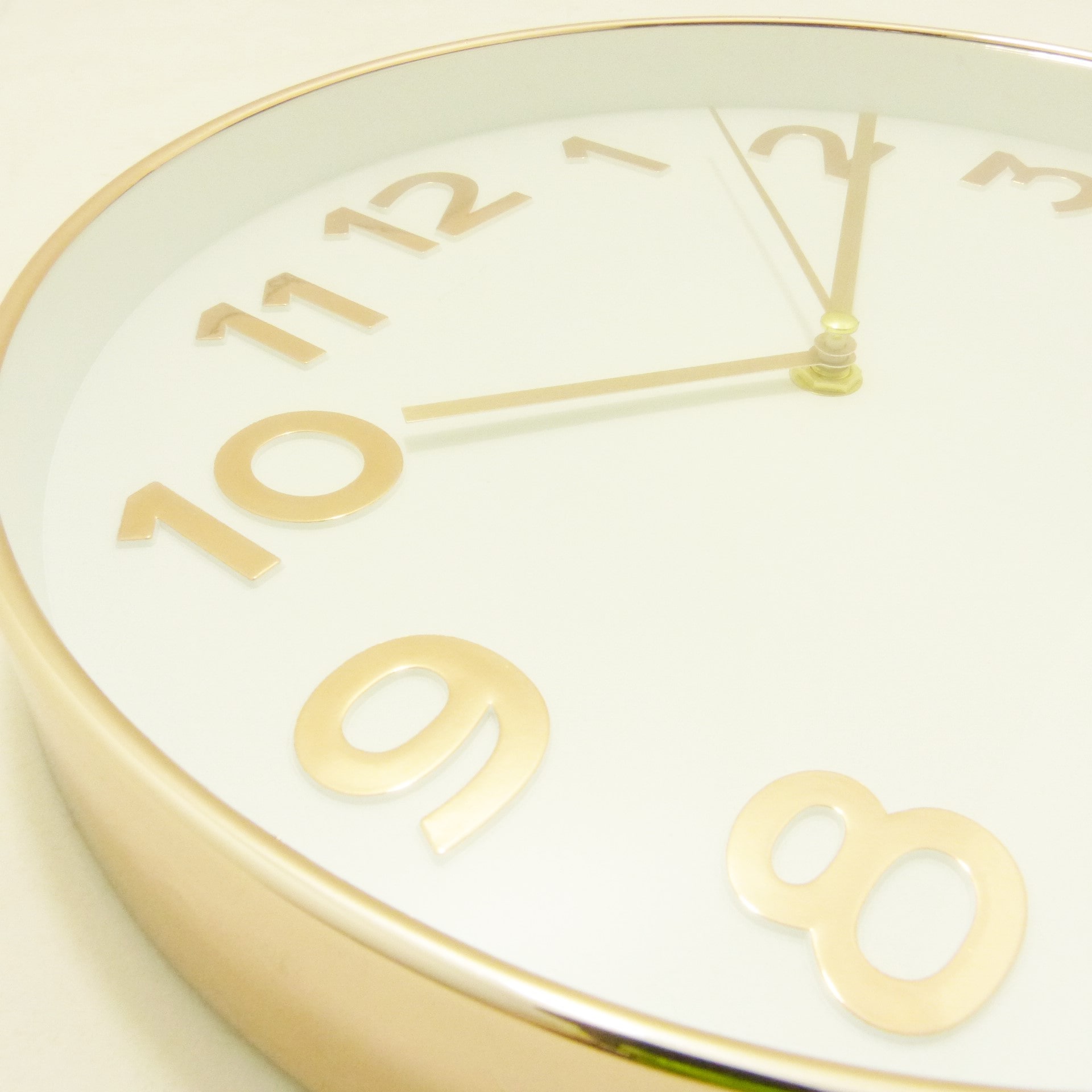 Reloj de pared redondo oro rosa