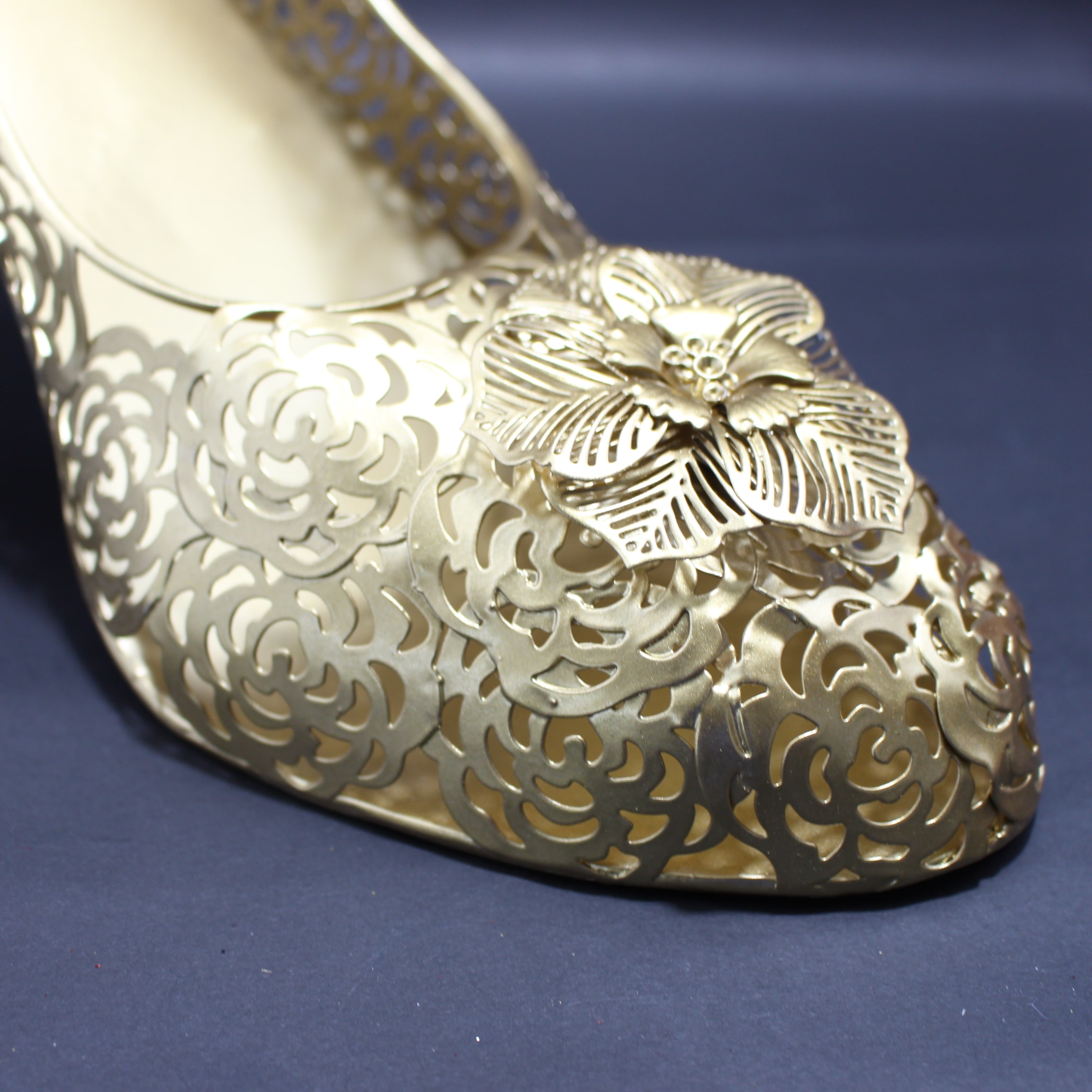 TACON DECORACION DORADO.