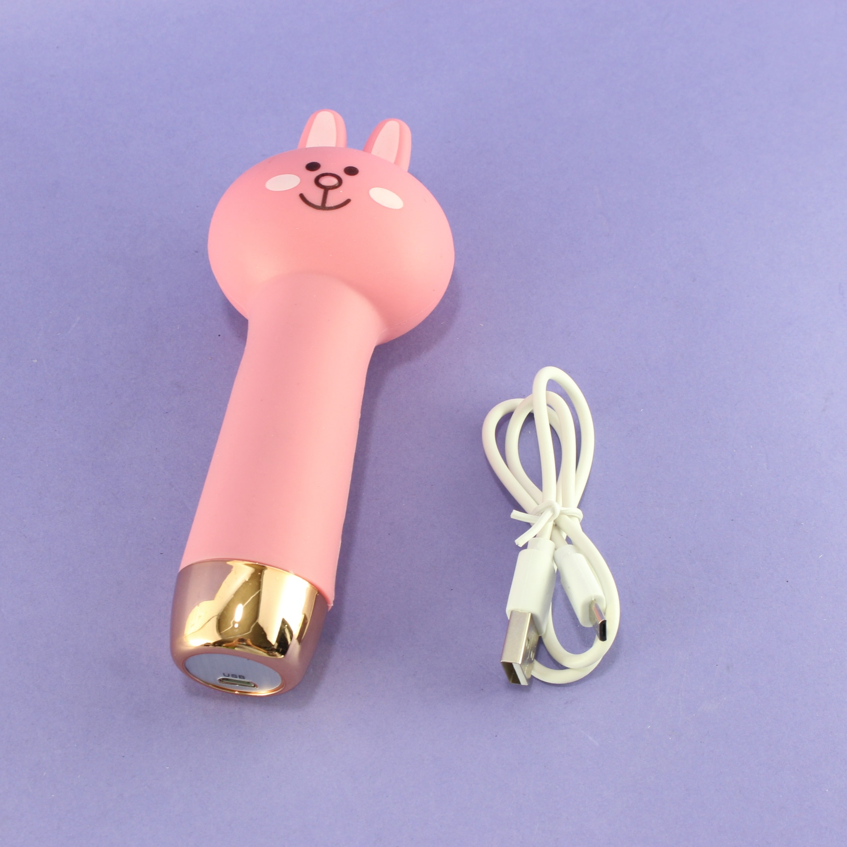 Masajeador facial electrónico conejo