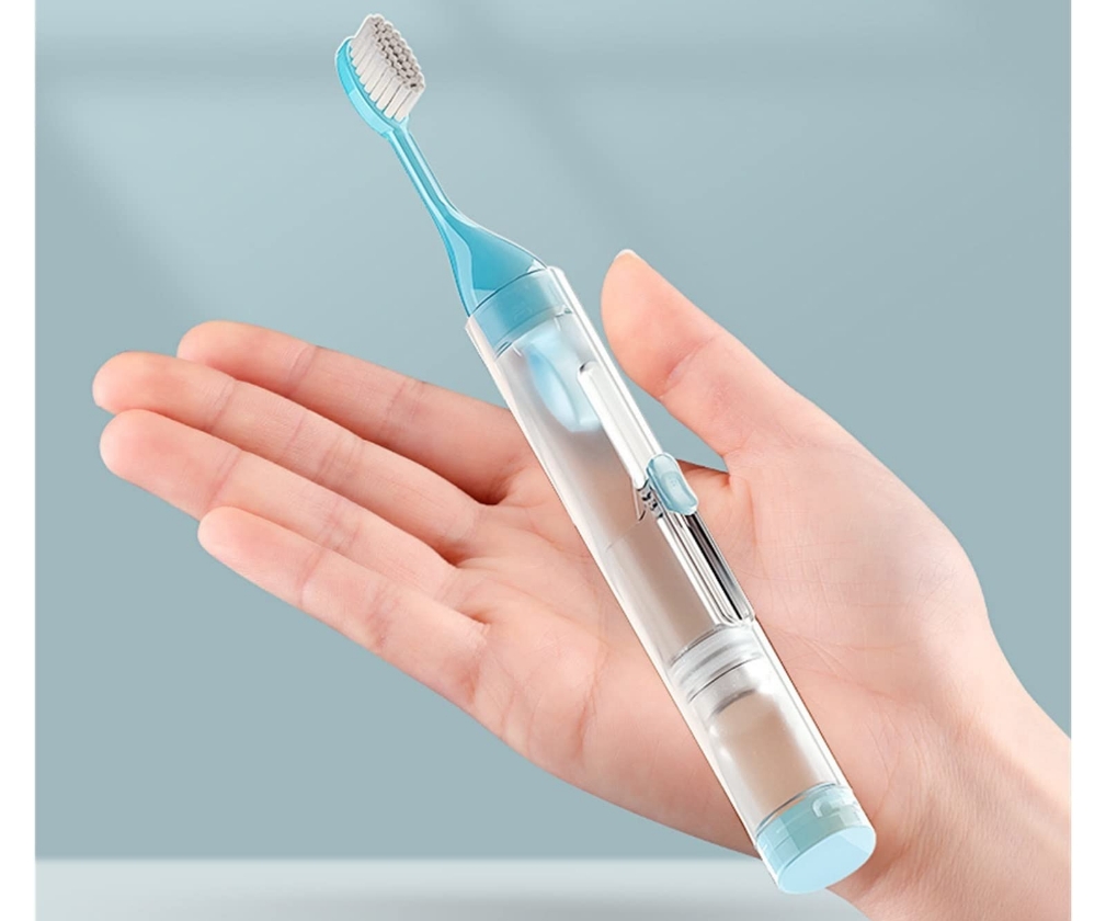 Cepillo de dientes dispensador crema