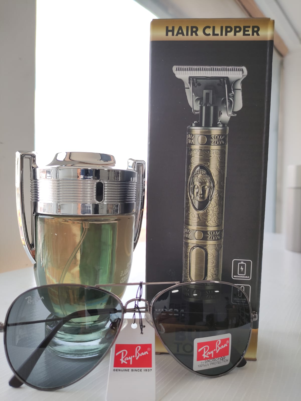 PERFUME INVICTUS + AFEITADORA + GAFAS