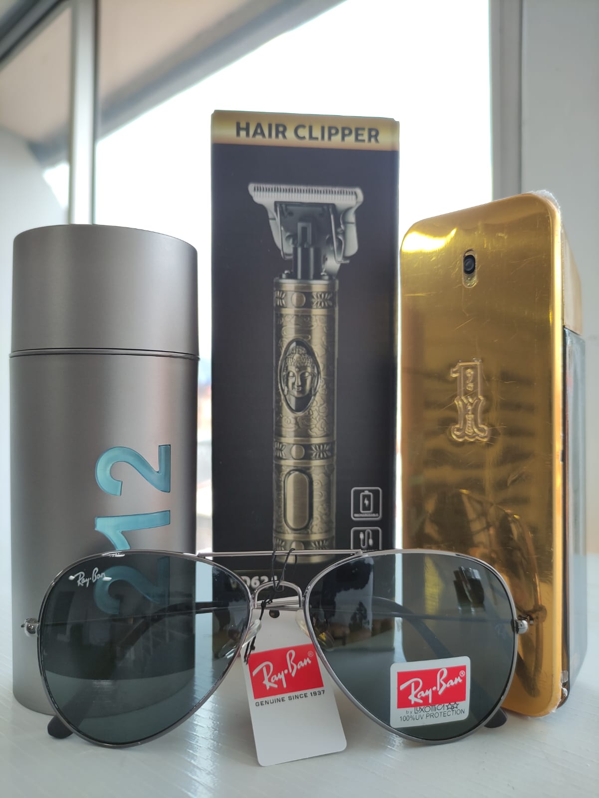 KIT 121 (2 PERFUMES + AFEITADORA +GAFAS)