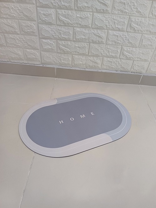 TAPETE ABSORBENTE OVALADO 60X40CM GRIS